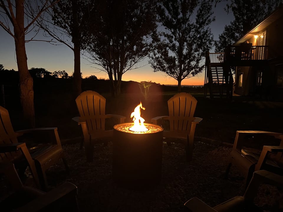Cozy up to the backyard fire pit (available April - October)