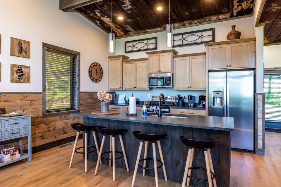 Bar stools add the perfect perch for easy dining, conversation, or a cozy start to the day.