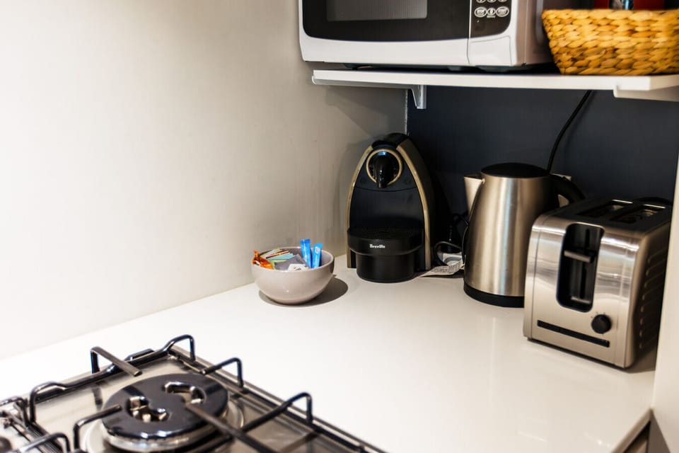 Cook up your favourite meals in the fully equipped kitchen with modern appliances and all the essentials.