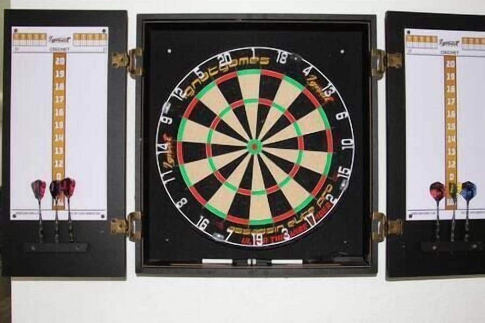 Darts are set up in the house.