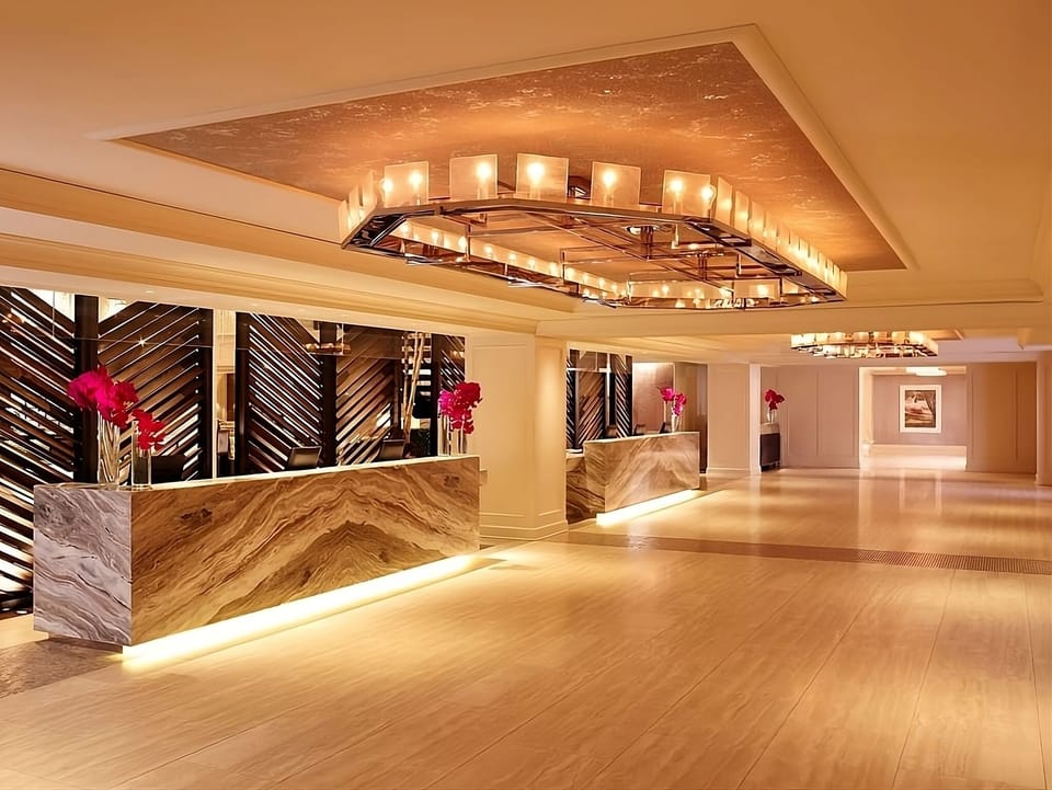 Arrive to a grand lobby that feels instantly luxurious.