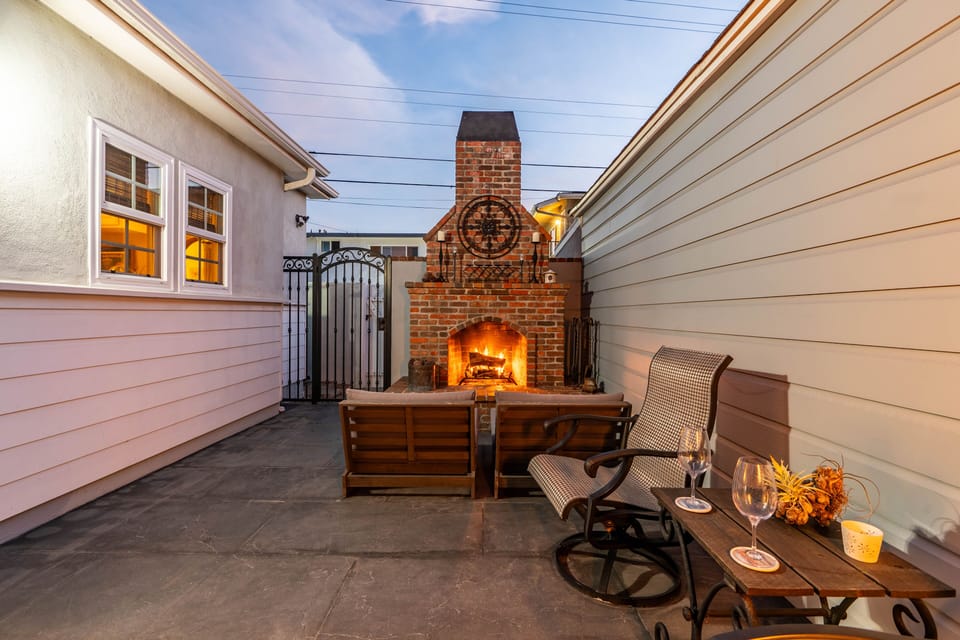 Fireplace with amenities provided including logs, kindling, s'mores kit, wine