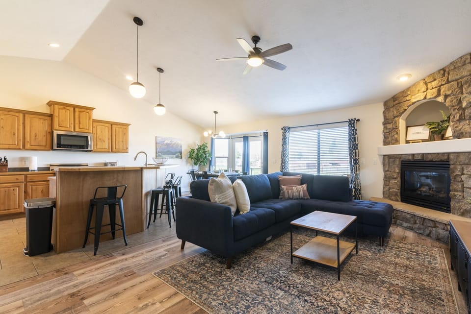 Great room opens to the living, dining room and kitchen.