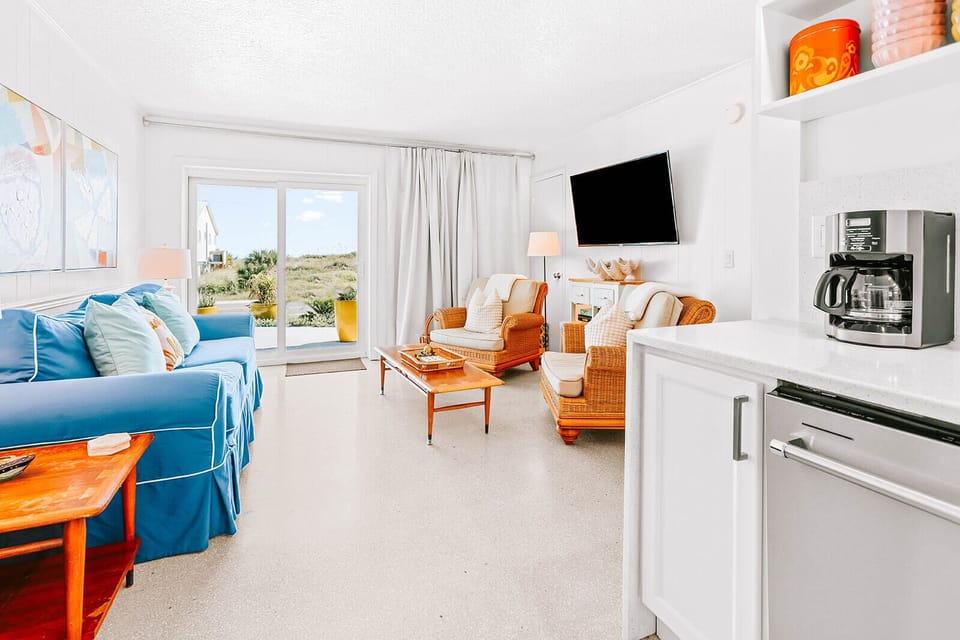 A second living space with its own kitchen and patio doors, giving everyone room to spread out. 
Downstairs Living Room