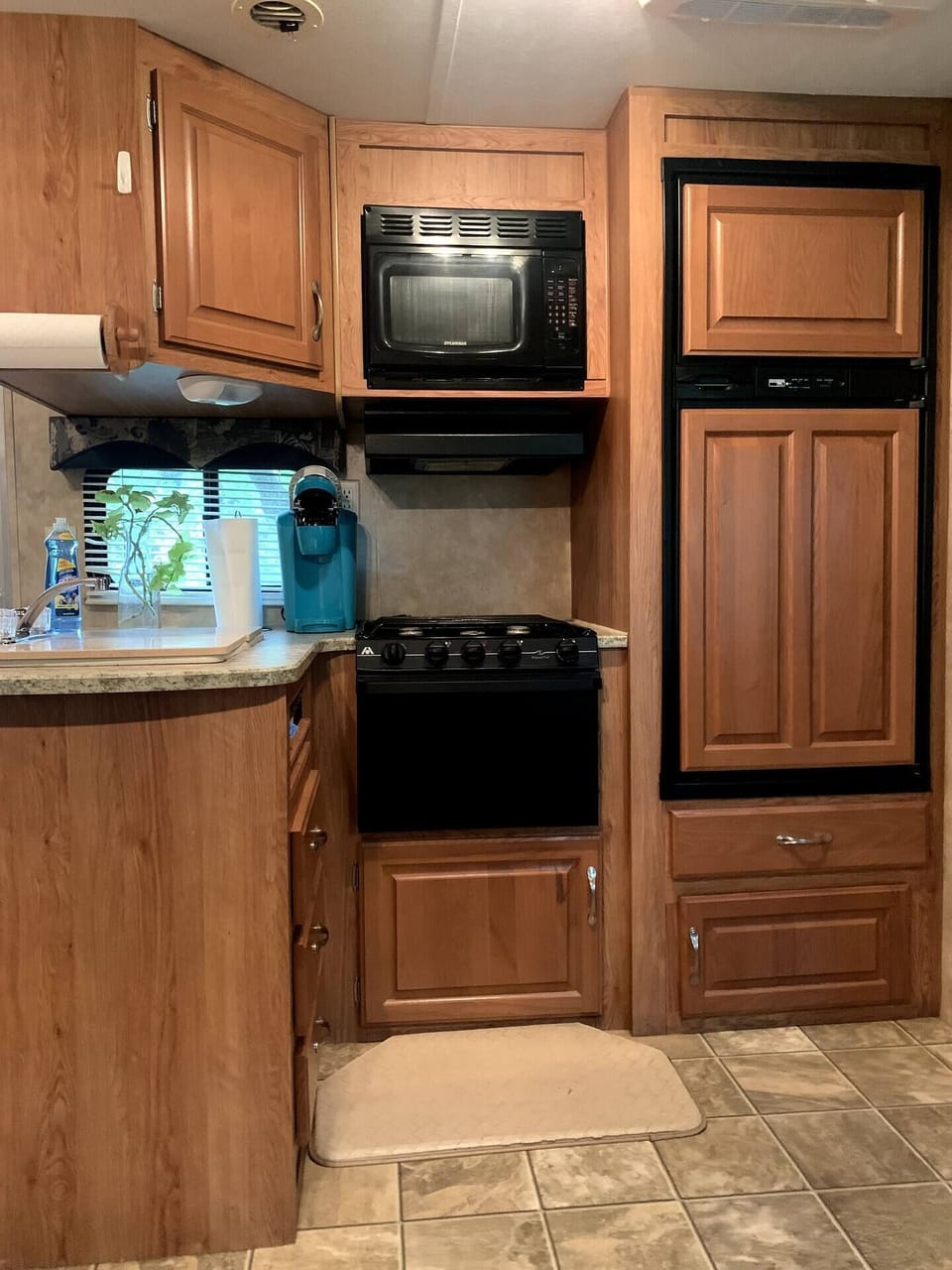 Kitchen is equipped with stove and oven. There is a refrigerator and small freezer and microwave to make your stay as easy as possible.