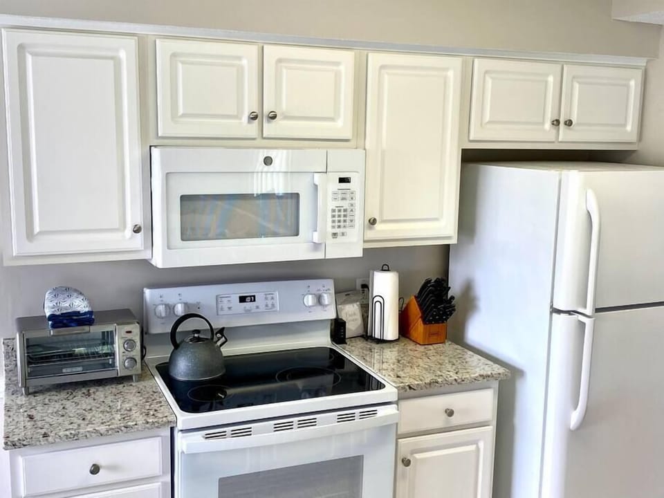 Fully equipped kitchen with brand new appliances. Cookware, glassware, and silverware all on site.