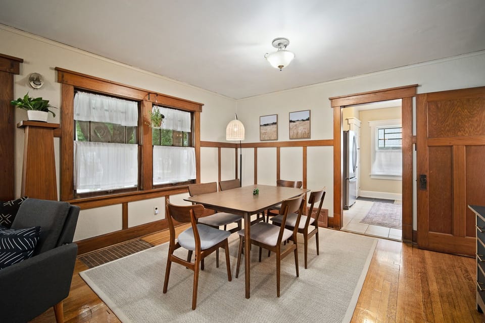 Dining room with tons of natural light and seating for 6.