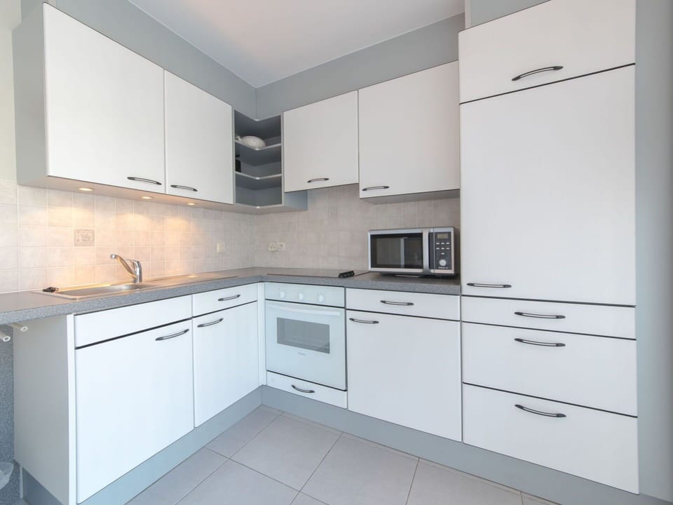 Cabinetry, Countertop, Furniture, Sink, Building, Kitchen Stove, Kitchen Sink, Kitchen, Drawer, Tap