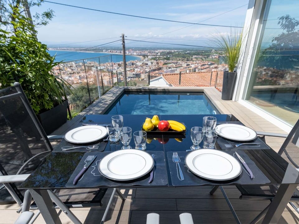 Water, Table, Furniture, Property, Sky, Tableware, Chair, Azure, Plant, Outdoor Furniture