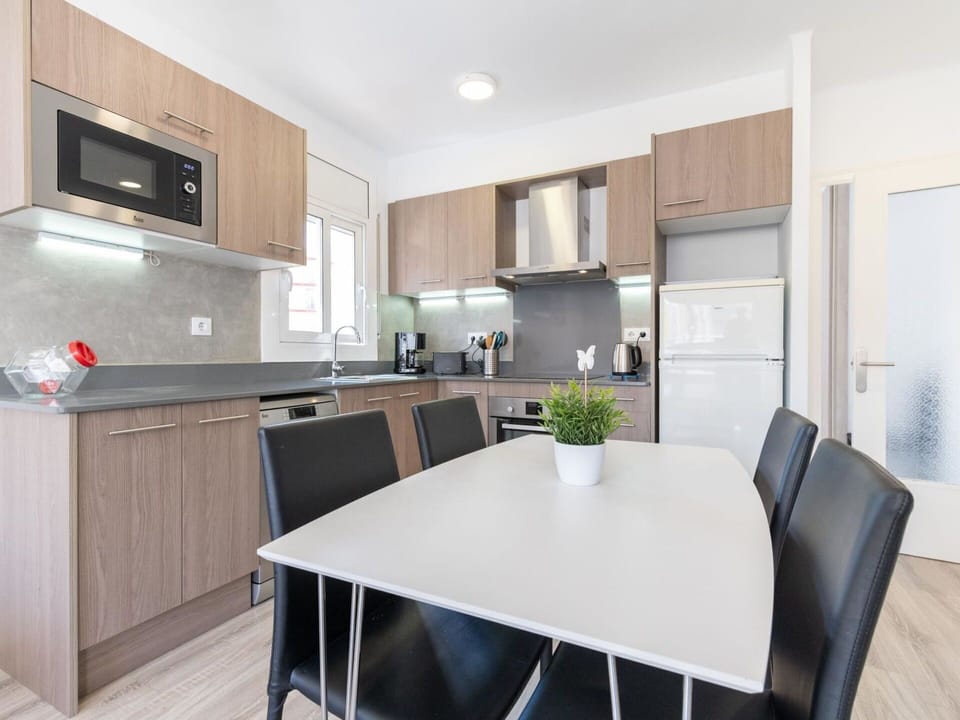 Cabinetry, Furniture, Property, Countertop, Table, Building, Chair, Wood, Interior Design, Plant