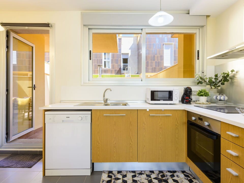 Countertop, Cabinetry, Kitchen Sink, Sink, Tap, Furniture, Property, Building, Kitchen Stove, Plumbing Fixture