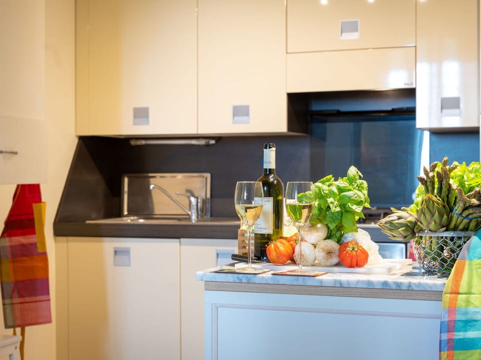Cabinetry, Property, Countertop, Kitchen, Blue, Kitchen Appliance, Kitchen Sink, Food, Orange, Home Appliance