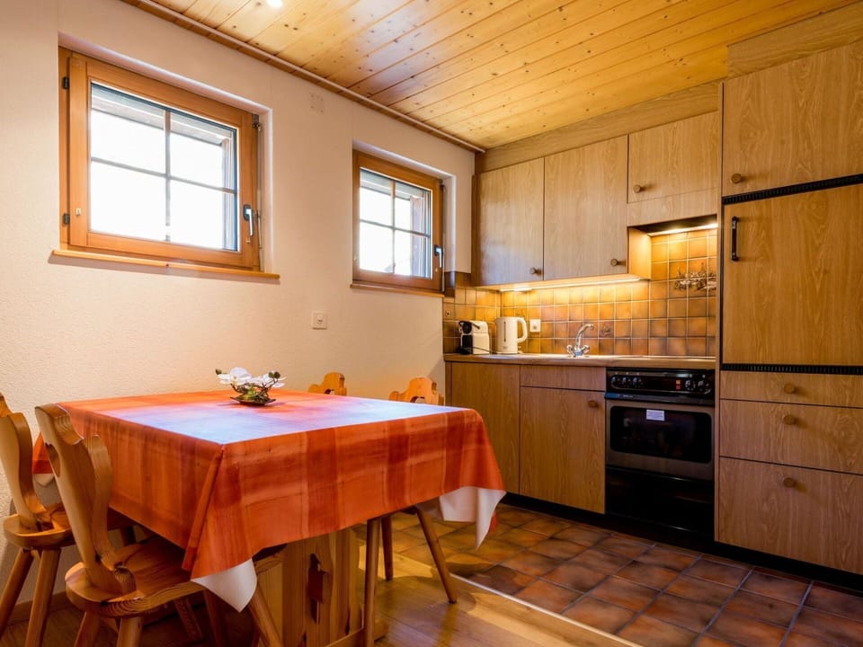 Furniture, Cabinetry, Property, Window, Building, Countertop, Table, Tap, Wood, Kitchen