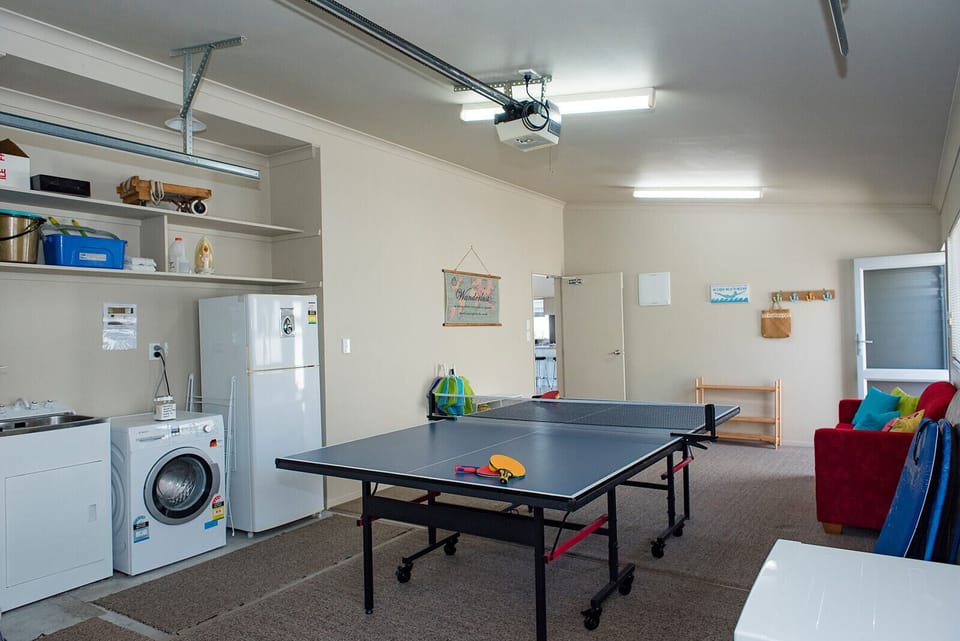 Laundry, drinks fridge, ping pong table and boogie boards - lots of free extras!