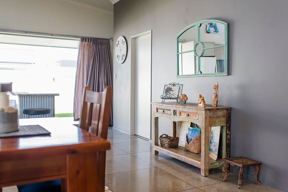 A funky beach aesthetic throughout this home gives a playful holiday vibe. 