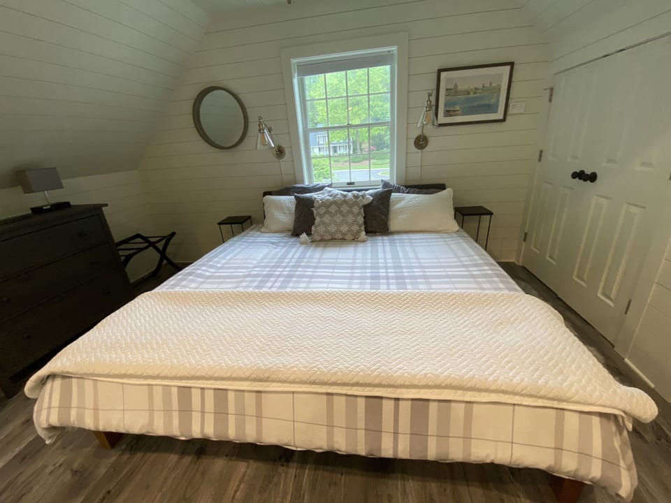 King-size bed with memory foam mattress and comfy bedding.
