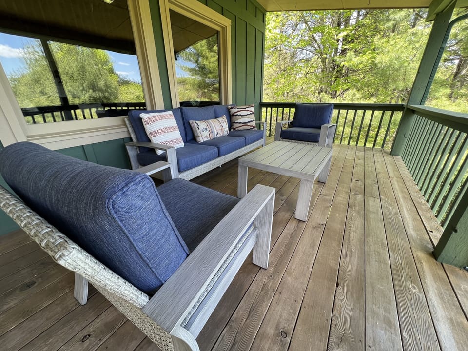 Upstairs Deck with conversation outdoor living area.