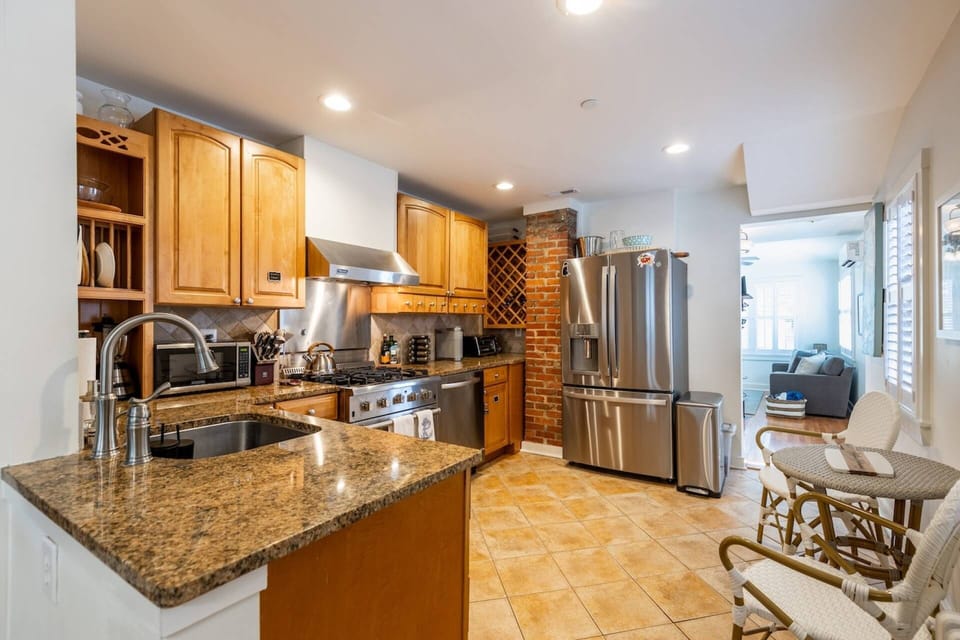 The gourmet kitchen is stocked and ready for your stay.