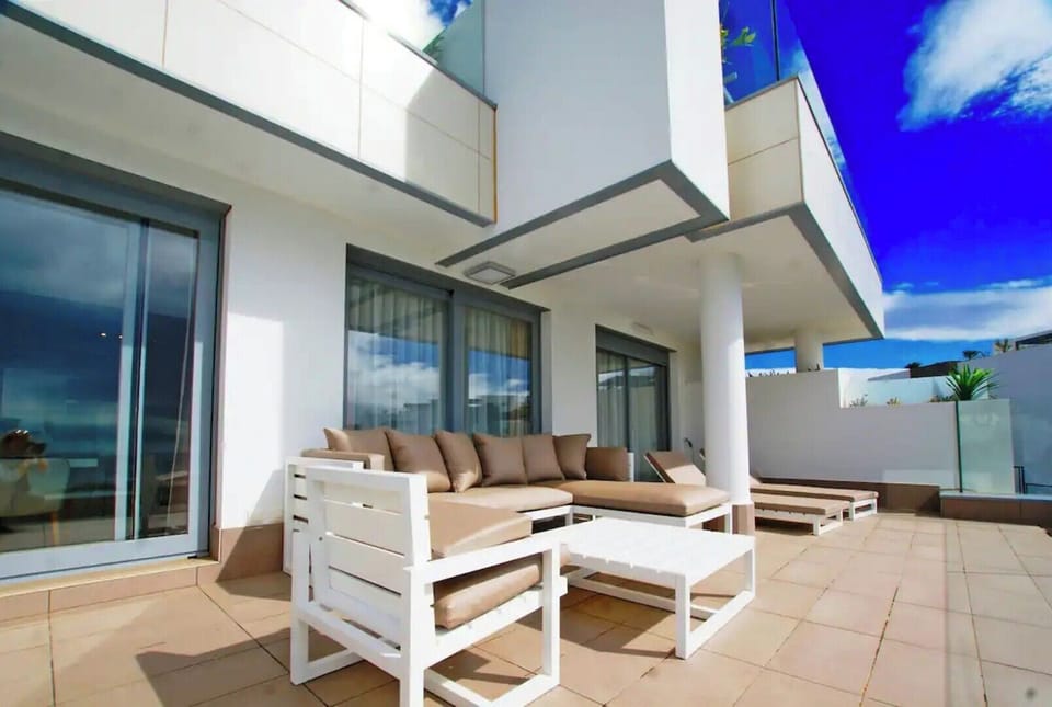 LARGE TERRACE WITH VIEWS OF GOLF COURSE & SEA 