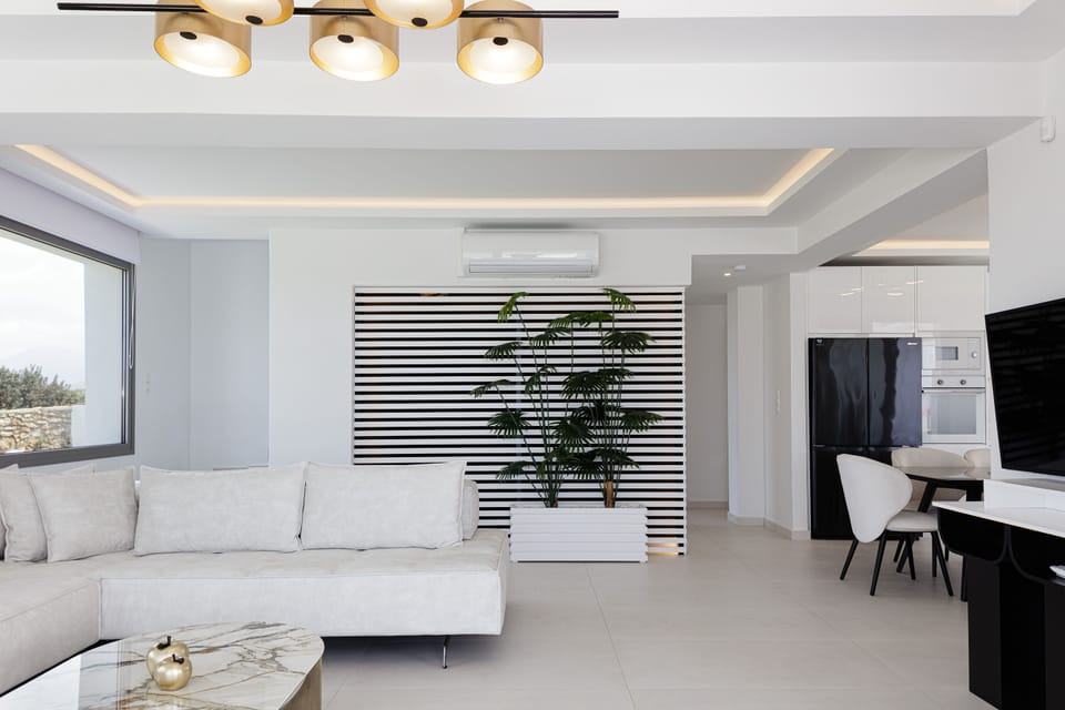 The living room is bright and filled with natural materials.