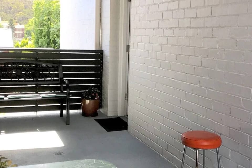 The entrance offers a quaint alfresco area with a bench to enjoy your morning cuppa in the crisp air.