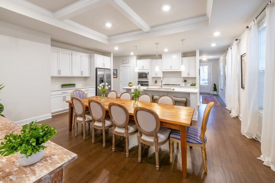 The dining room area is located directly off of the kitchen and has seating for 10.