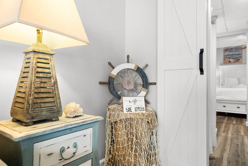 Charming nautical décor touches add a warm coastal feel throughout the condo.