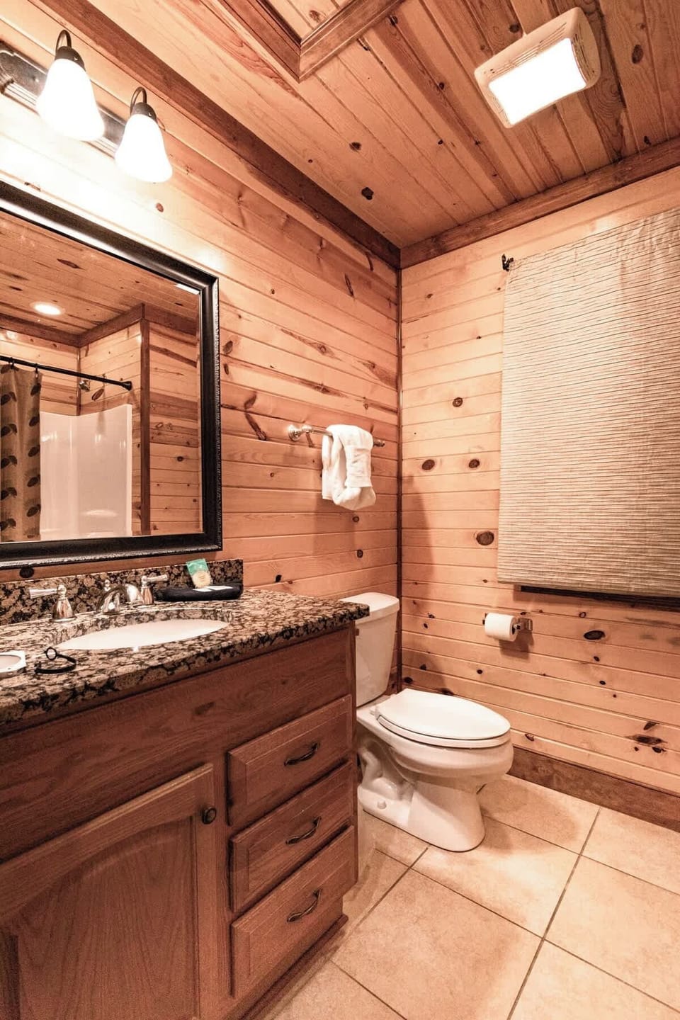 Up on the second floor, this bathroom’s got all the essentials. Sink, shower, and toilet, perfect for getting ready before another fun day in the mountains.