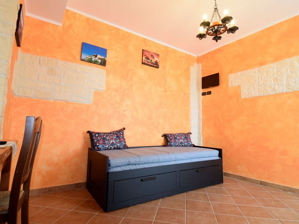 Furniture, Property, Comfort, Wood, Azure, Interior Design, Orange, Lighting, House, Architecture