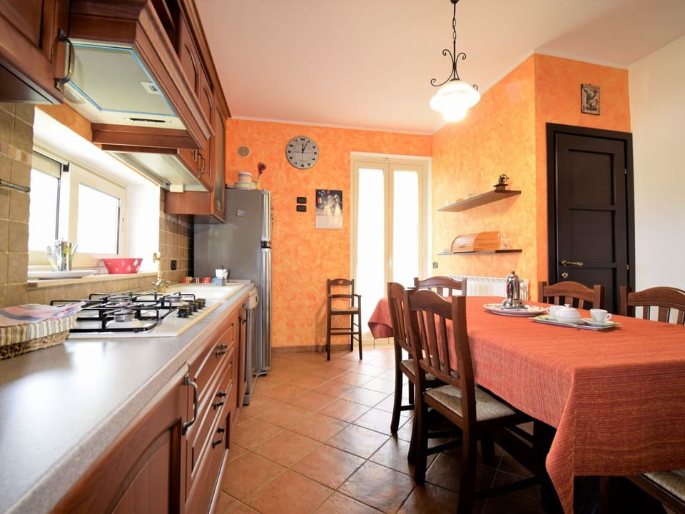 Table, Furniture, Property, Cabinetry, Countertop, Chair, Wood, Orange, Sink, Building