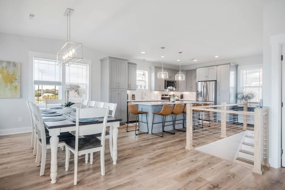 Large open dining area and kitchen with 6 bar stools