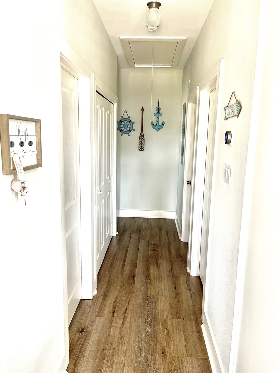 Hallway leading to bedrooms and laundry room 