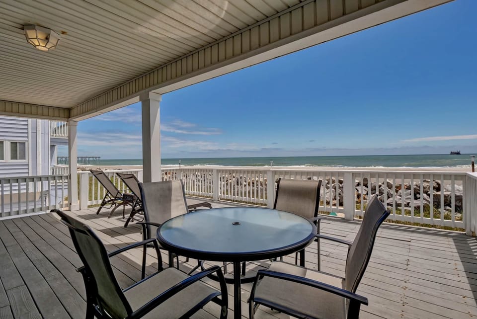 There is room to dine, sunbathe and play on this huge oceanfront deck!