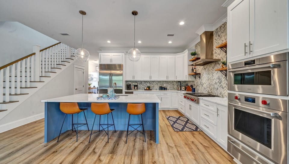 The kitchen island provides extra seating!