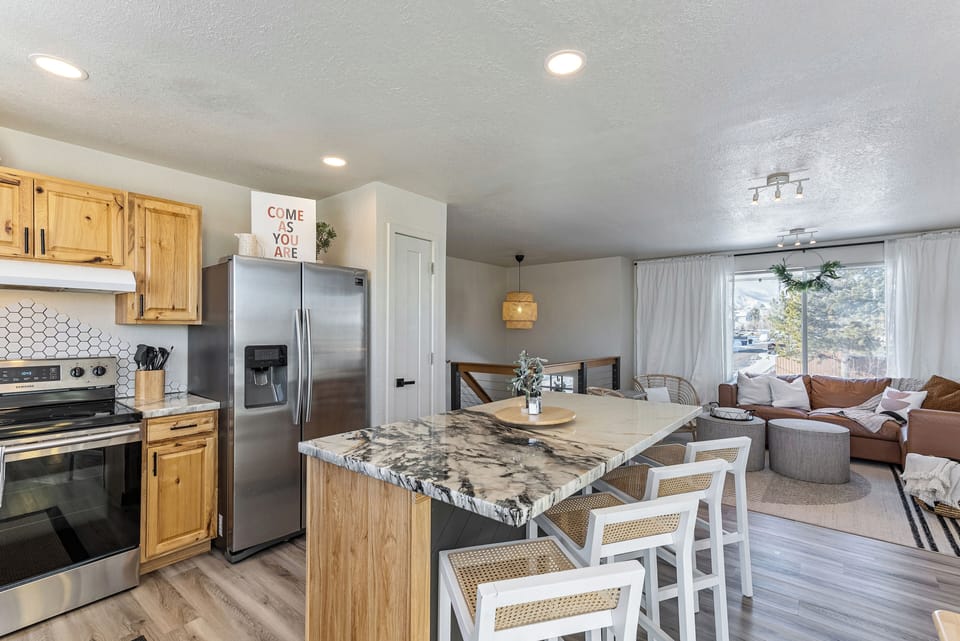 Kitchen with island seating.