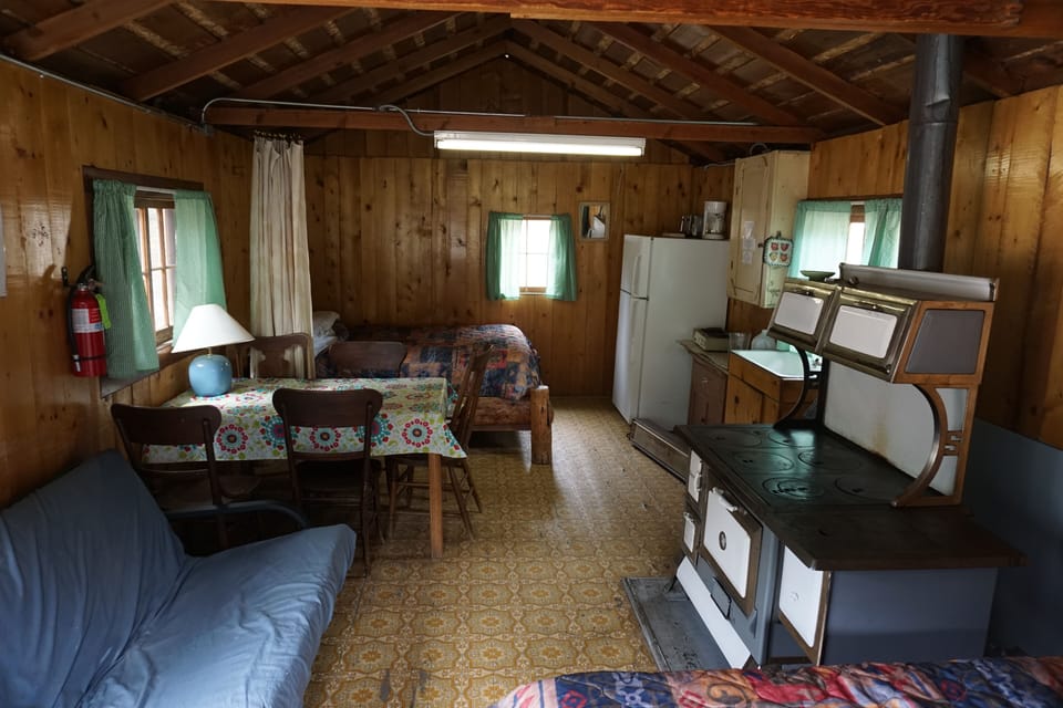 Cabin 3 features two full size beds and a futon.