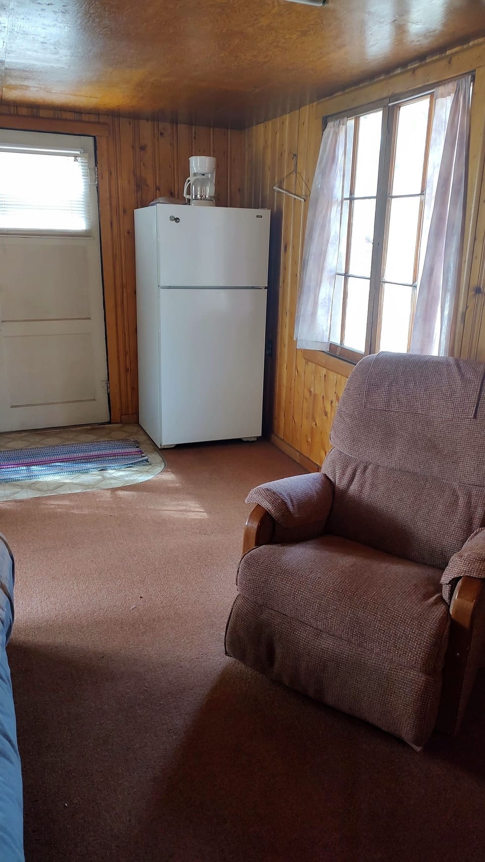 Cabin 11 features two recliners and a full size fridge.