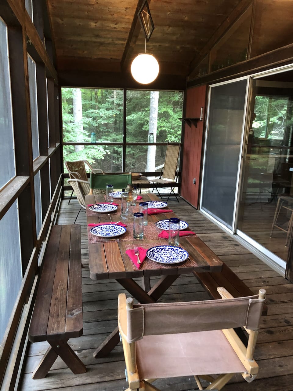 2nd floor screened in deck with hammock and eating area
