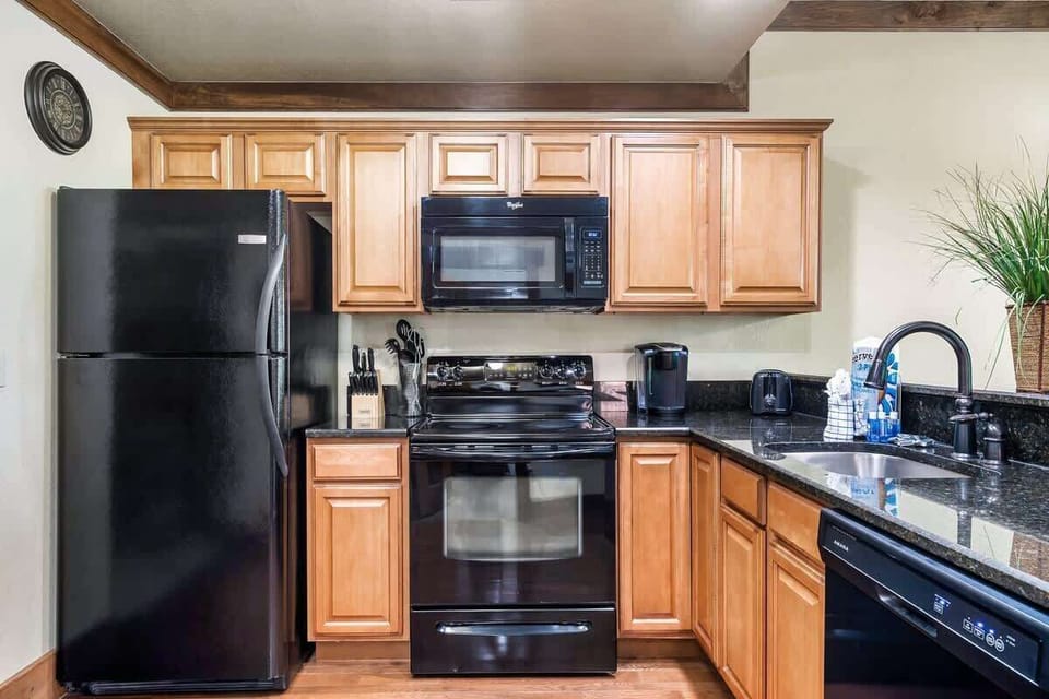 Embracing the perfect blend of modern elegance and rustic charm in this stunning kitchen,not just functional but also a feast for the eyes.