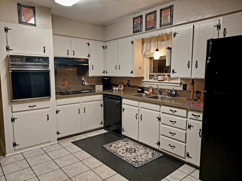 Full kitchen with too much to mention! Home has 2 refrigerators