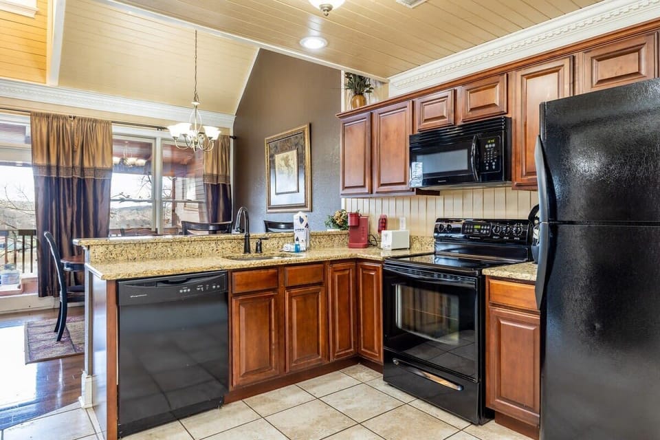 And, open space with a balcony view that includes a hot tub and BBQ grill, entertaining has never been more inviting.