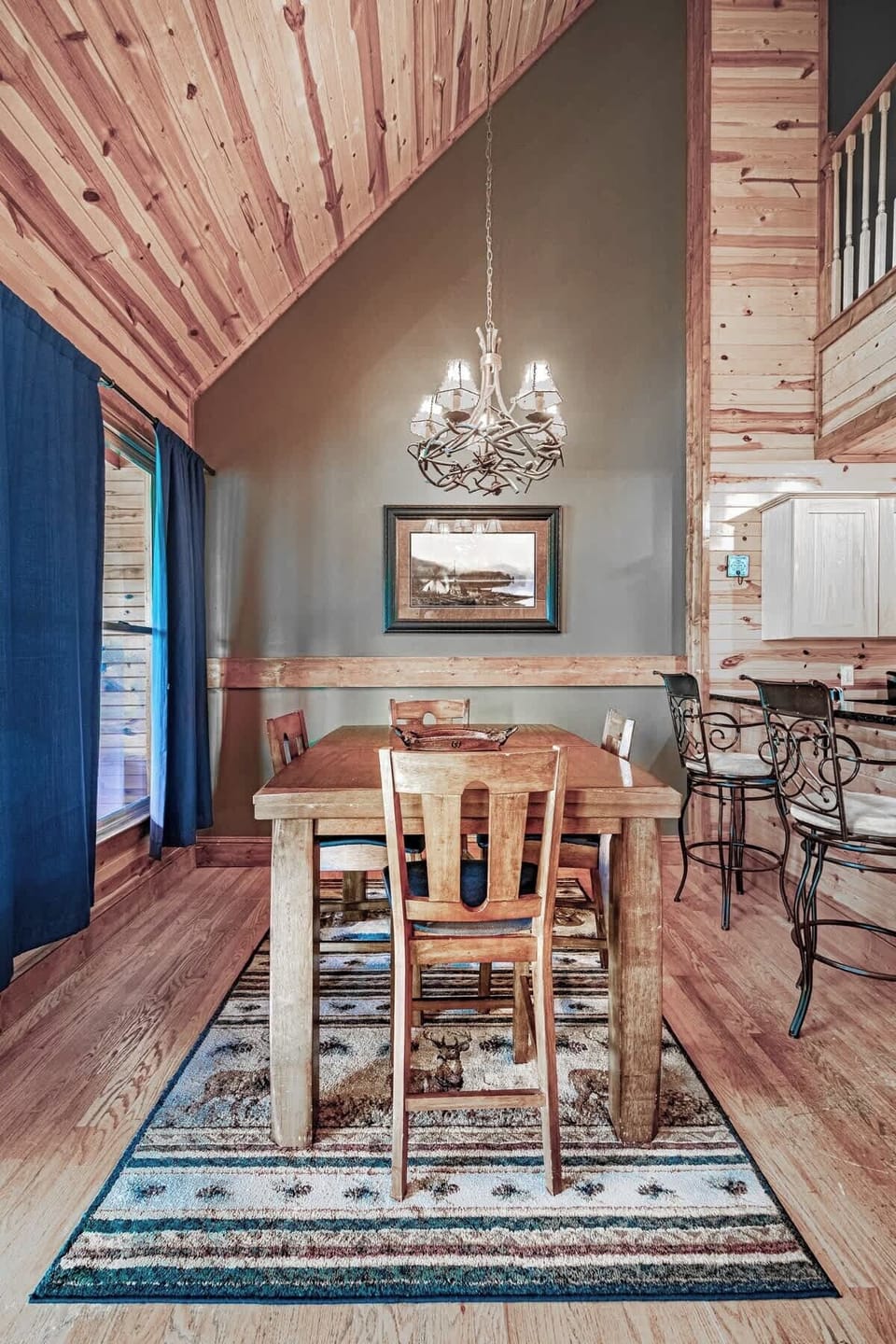 Our dining area and rustic table are perfect for enjoying a meal or even a board game with family & friends!
