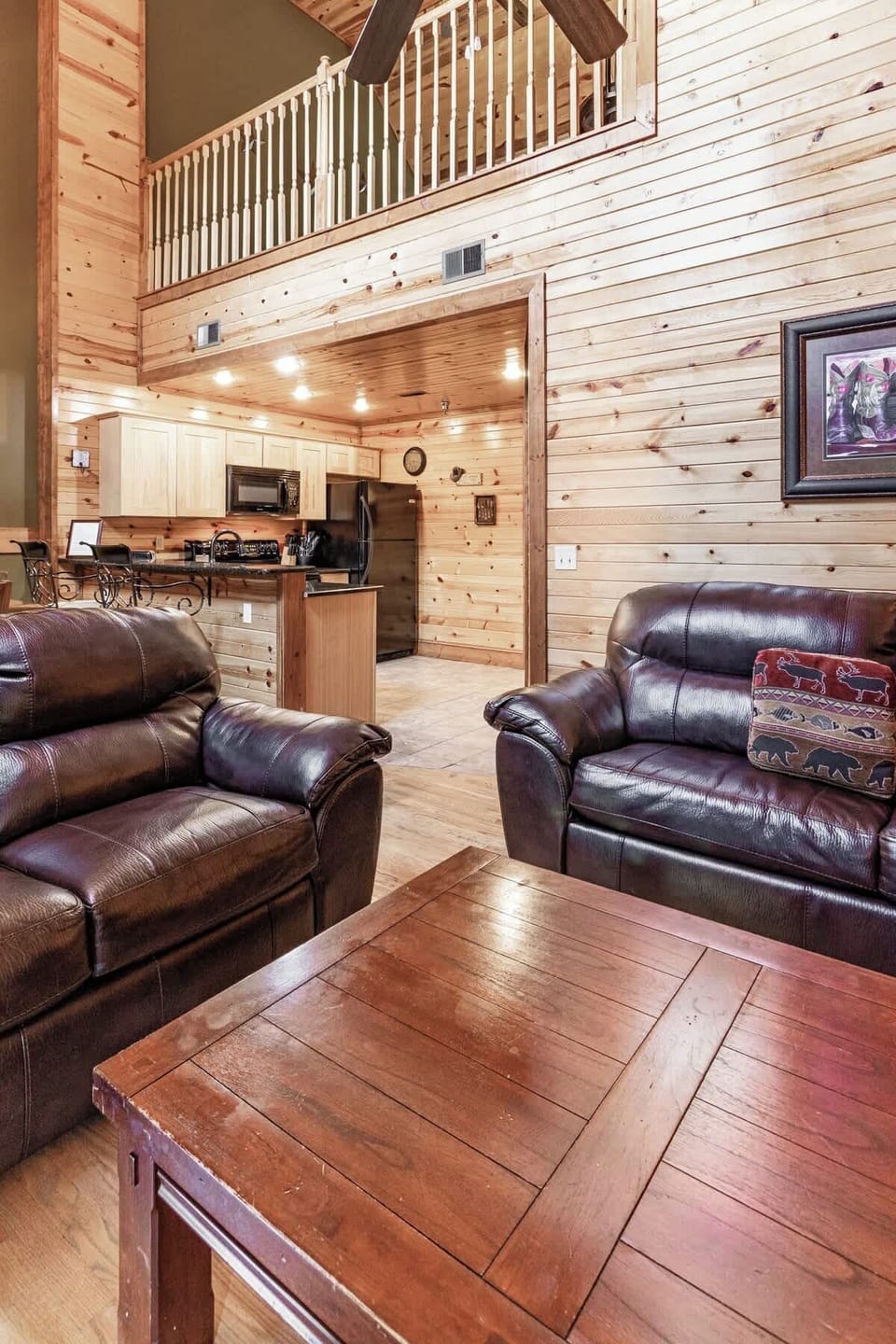 The living area is conveniently located right by the kitchen and dining areas