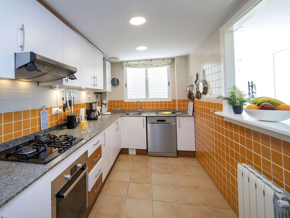 Kitchen, Countertop, Kitchen Appliance, Cabinetry, Major Appliance, Interior Design, Flooring, Kitchen Sink, Kitchen Stove, Sink