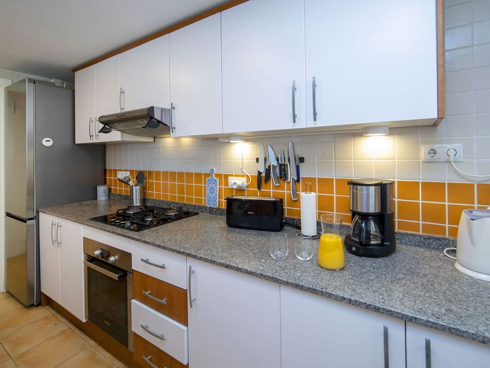Kitchen, Countertop, Kitchen Appliance, Major Appliance, Cabinetry, Sink, Interior Design, Kitchen Sink, Kitchen Stove, Plumbing Fixture