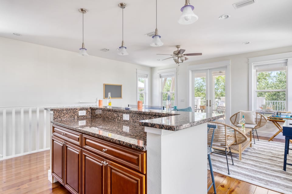 Shake up a cocktail at the family room's wet bar.