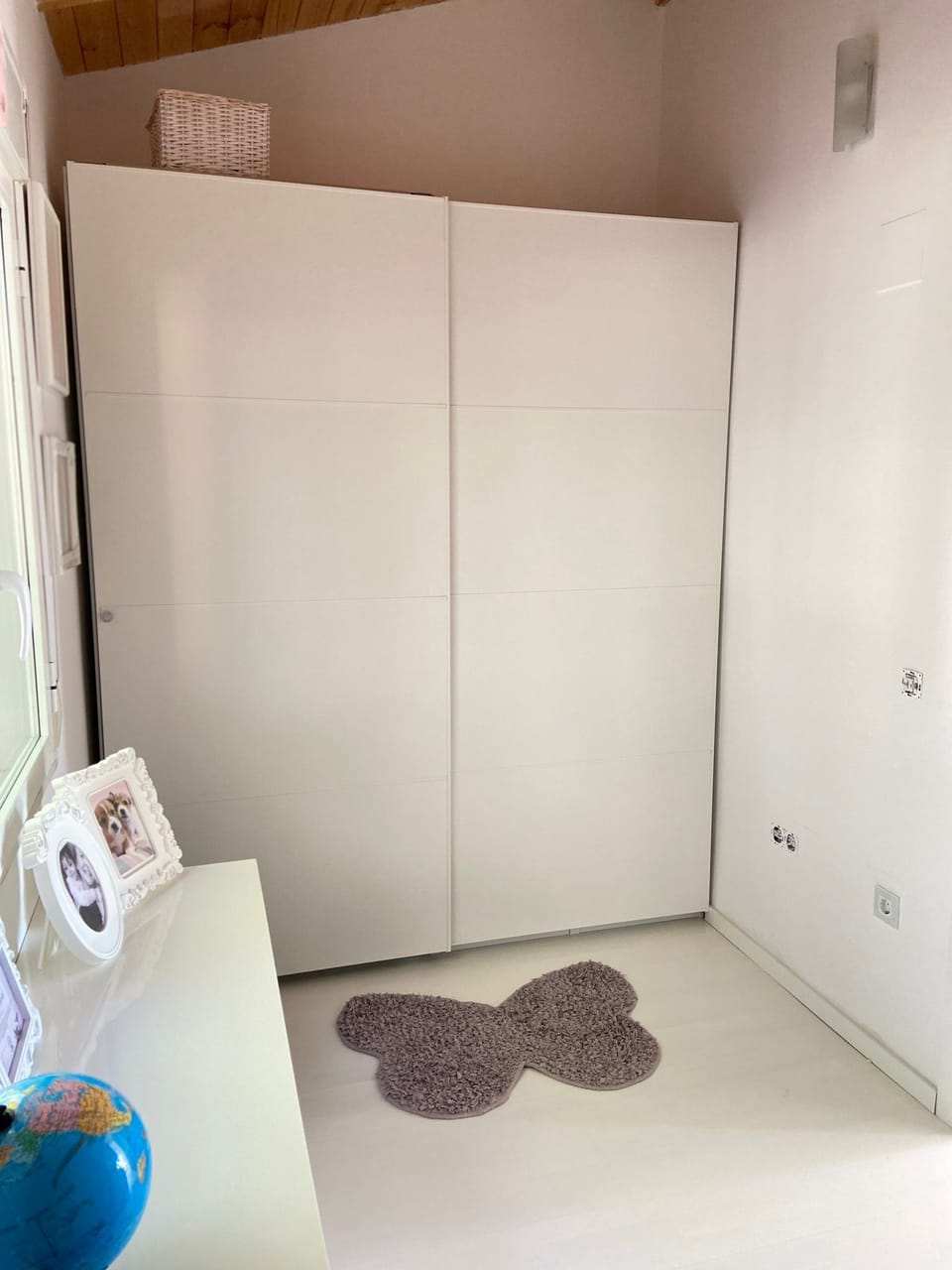 Upper 3rd bedroom 2 single beds and fitted wardrobes. Double aspect window.