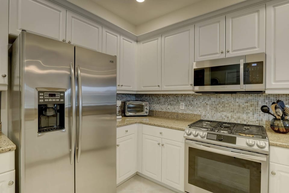 The Kitchen Includes a Gas Stove - A Real Commodity in SW Florida!
