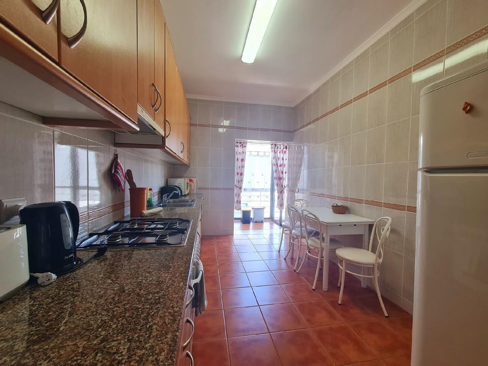 Kitchen with laundry room