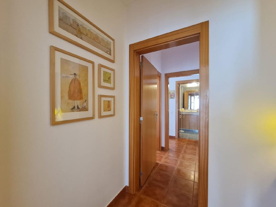 Hall to the bedrooms and bathrooms